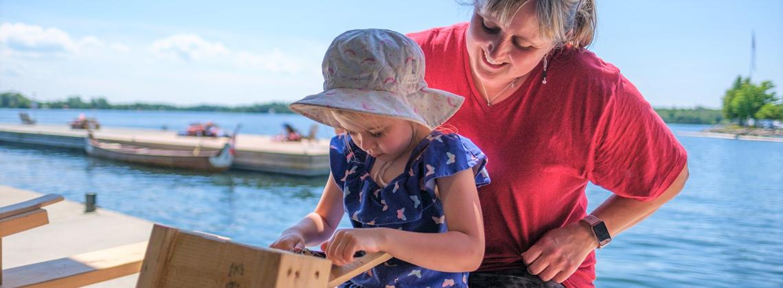 Child and parent enjoying a craft